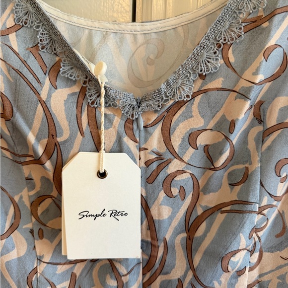 Elegant Blue and Brown Patterned Dress - Picture 3 of 6